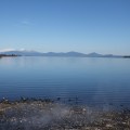 Lake Taupo with volcanos in the distance